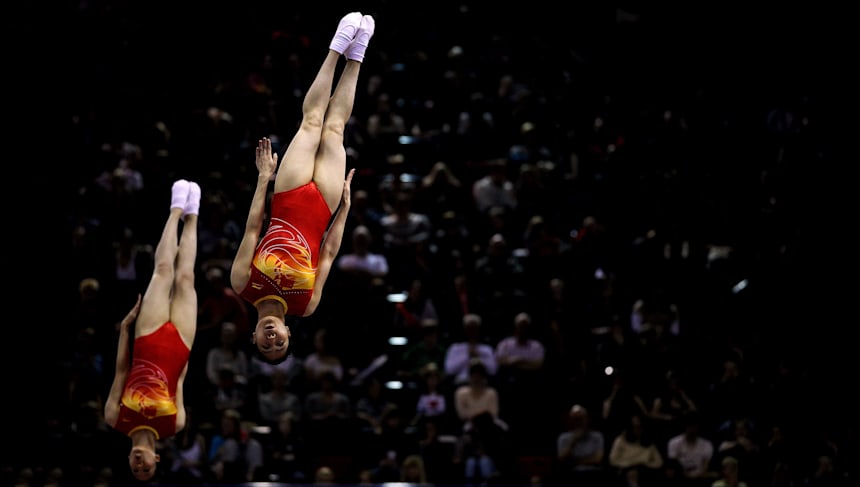 Dan Li and Xingping Zhong of China compete in the Womens Synchronized Trampoline