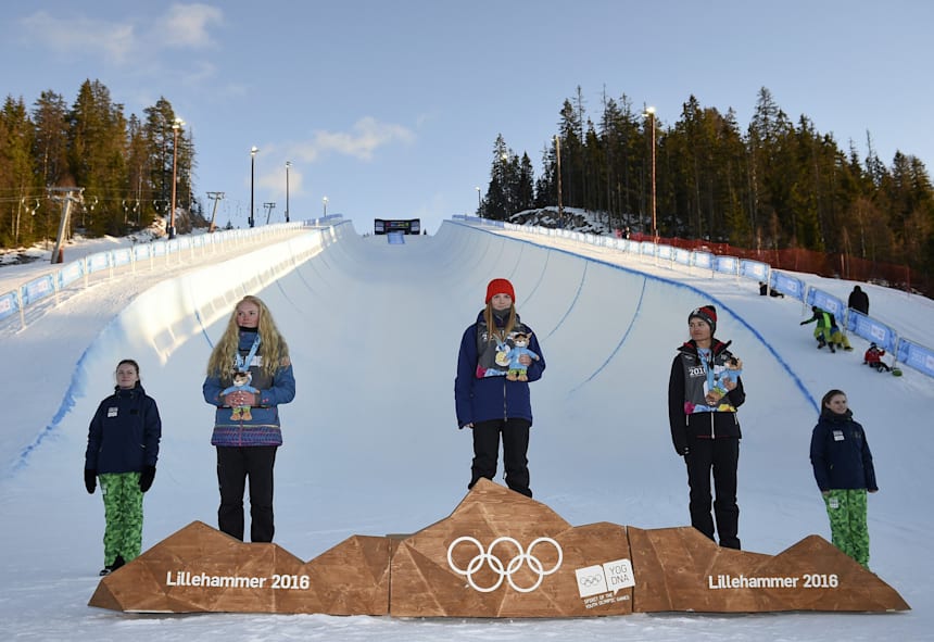 Paula Cooper (USA, left), Great Britain's Madison Rowlands and Lara Wolf, of Austria, collect their medals at the Oslo Vinterpark Halfpipe.