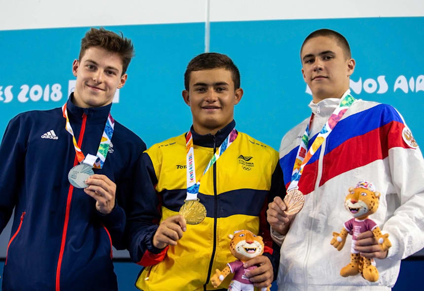 Colombia’s Daniel Restrepo Garcia, who won the 3m springboard, with Anthony Harding (GBR) and Russia’s Ruslan Ternovoi (Ivo Gonzalez for OIS/IOC)