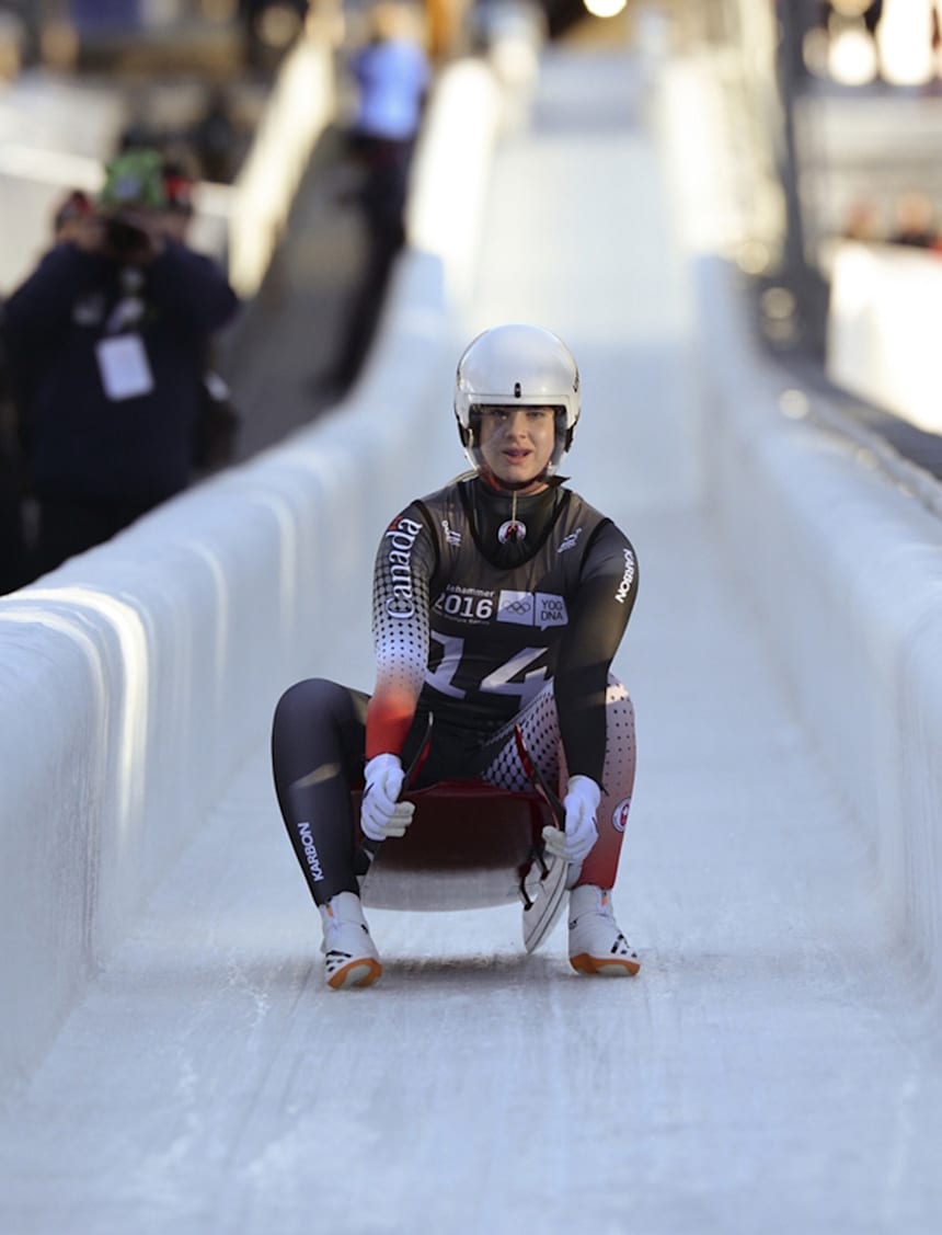 Brooke Apshkrum sits up at the end of her gold-medal winning luge run. Photo: YIS / IOC Jon Buckle