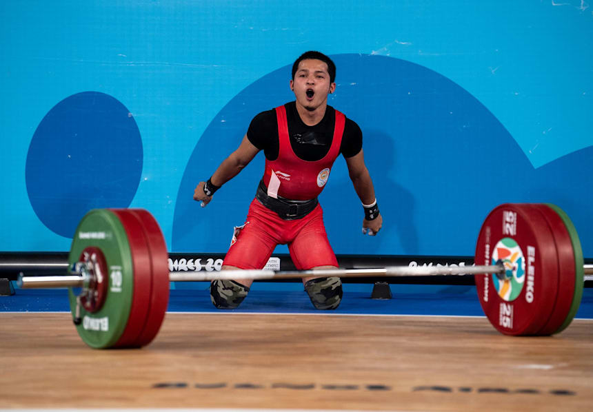 India's Lalrinnunga Jeremy celebrates victory after his final clean & jerk lift in the men's 62g category (IOC/OIS)