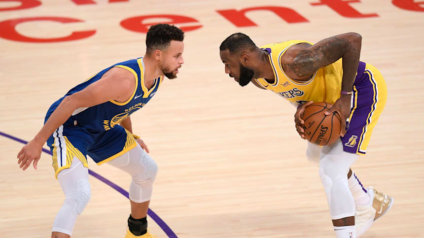 Stephen Curry of Golden State Warriors overtakes LeBron James of