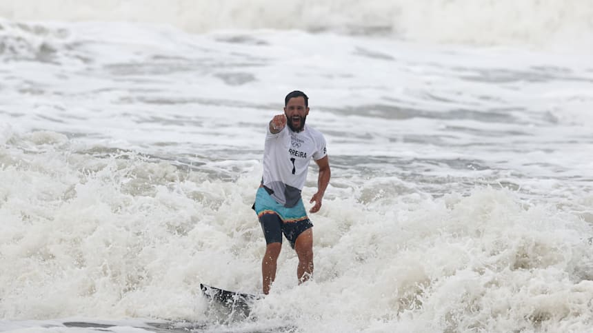 Italo Ferreira of Team Brazil shows emotion after winning the Gold Medal in the men's Surfing final match against Kanoa Igarashi of Team Japan on day four of the Tokyo 2020 Olympic Games at Tsurigasaki Surfing Beach on July 27, 2021 in Ichinomiya, Chiba, Japan. 