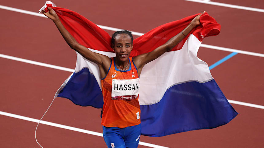 Sifan Hassan celebrates 10,000m flag
