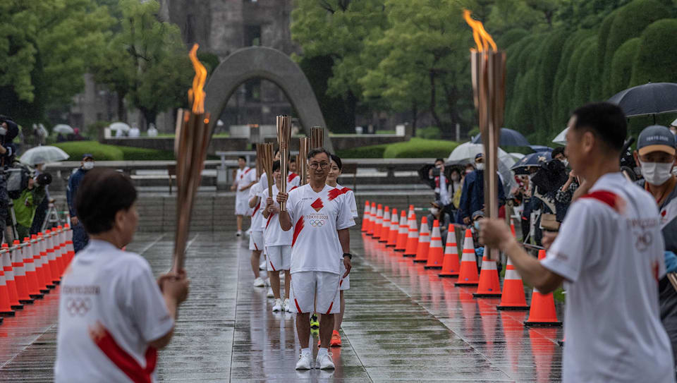 Olympic and Hiroshima Peace Flames United for Peace Olympic News