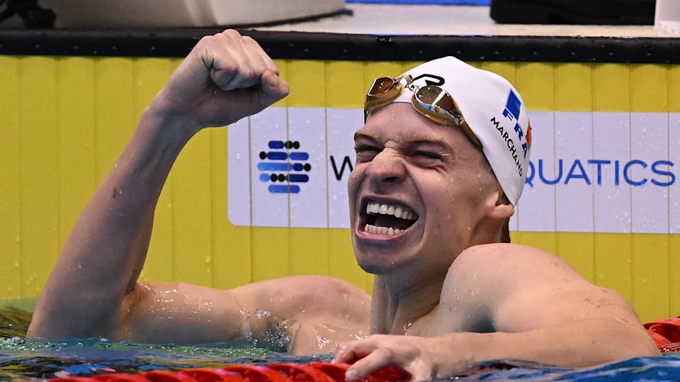 Leon Marchand of Team France celebrates winning gold in the Men's 400m Individual Medley in 2023