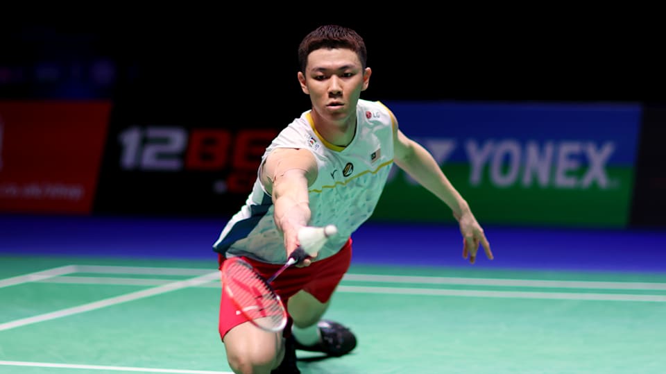 Malaysia badminton star Lee Zii Jia in dives to make a shot