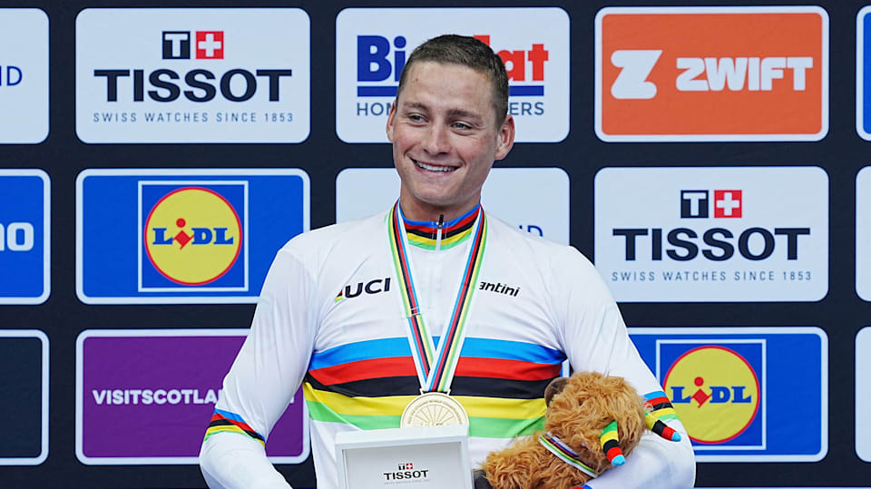 Mathieu van der Poel celebrates his road race title at the 2023 UCI Cycling World Championships