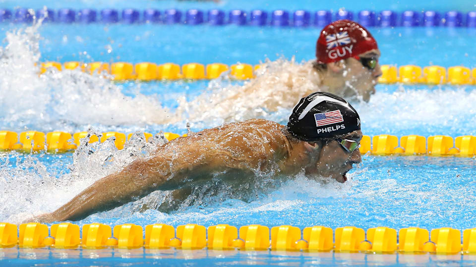 Michael Phelps swimming alongside James Guy at Rio 2016 Olympics