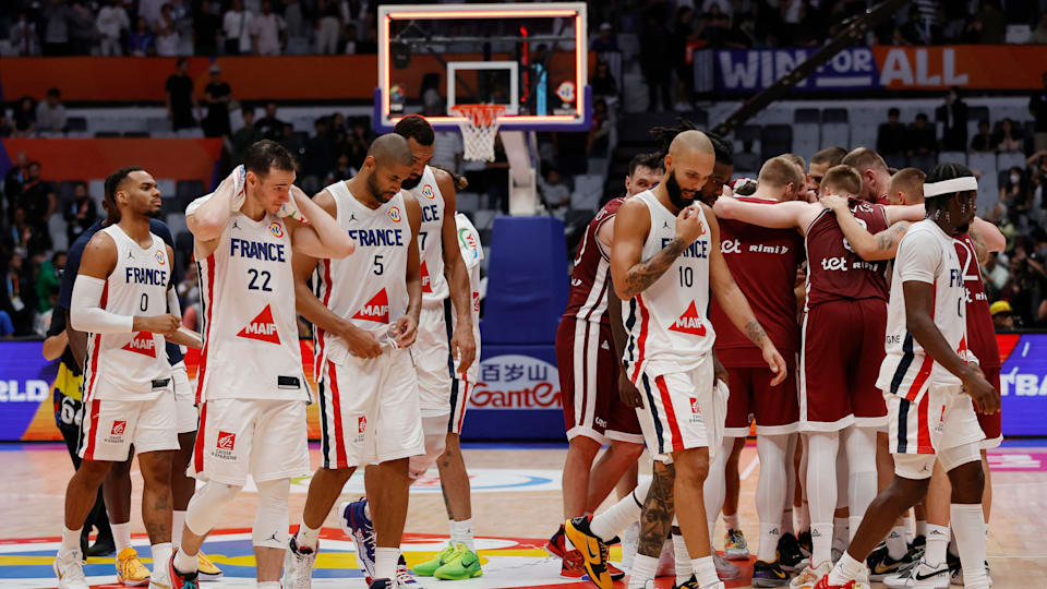 Dejected French players take off their World Cup runners-up medals