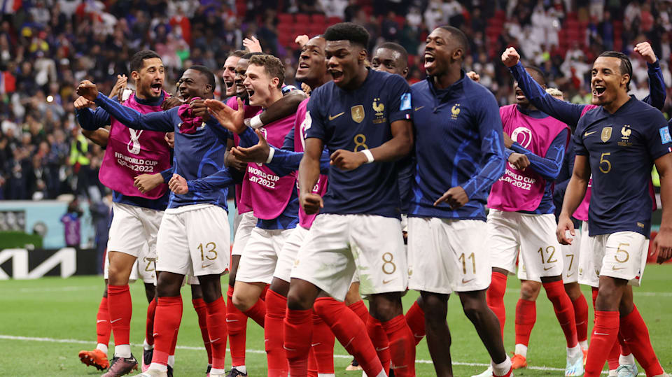 Dejected French players take off their World Cup runners-up medals