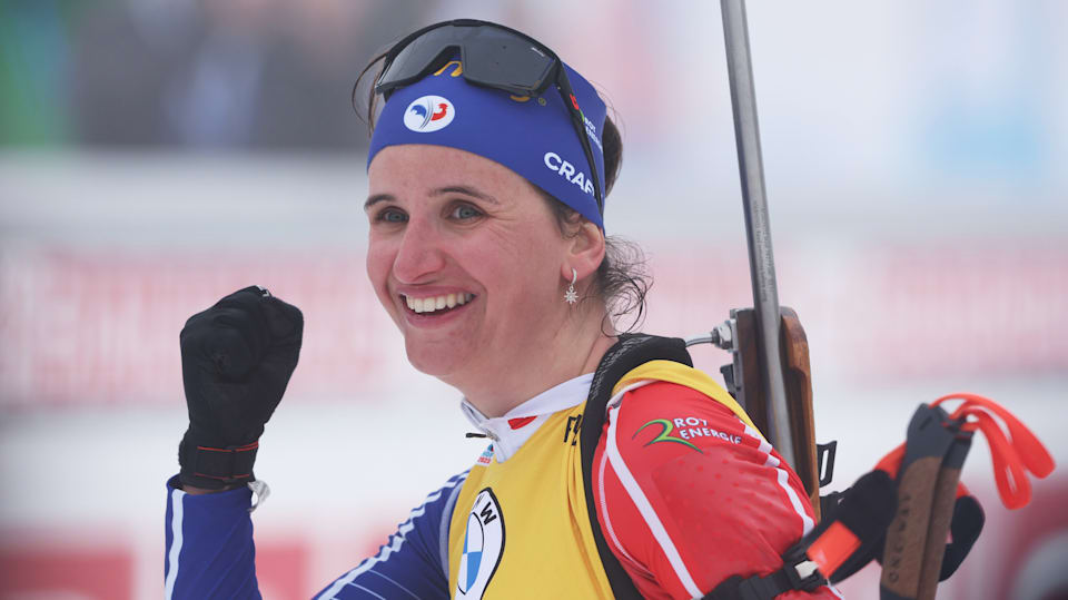 Julia Simon of France celebrates after crossing the finish line to win the Women 10 km Pursuit at the IBU World Championships Biathlon Oberhof on February 12, 2023 in Oberhof, Germany. (Photo by Alexander Hassenstein/Getty Images)