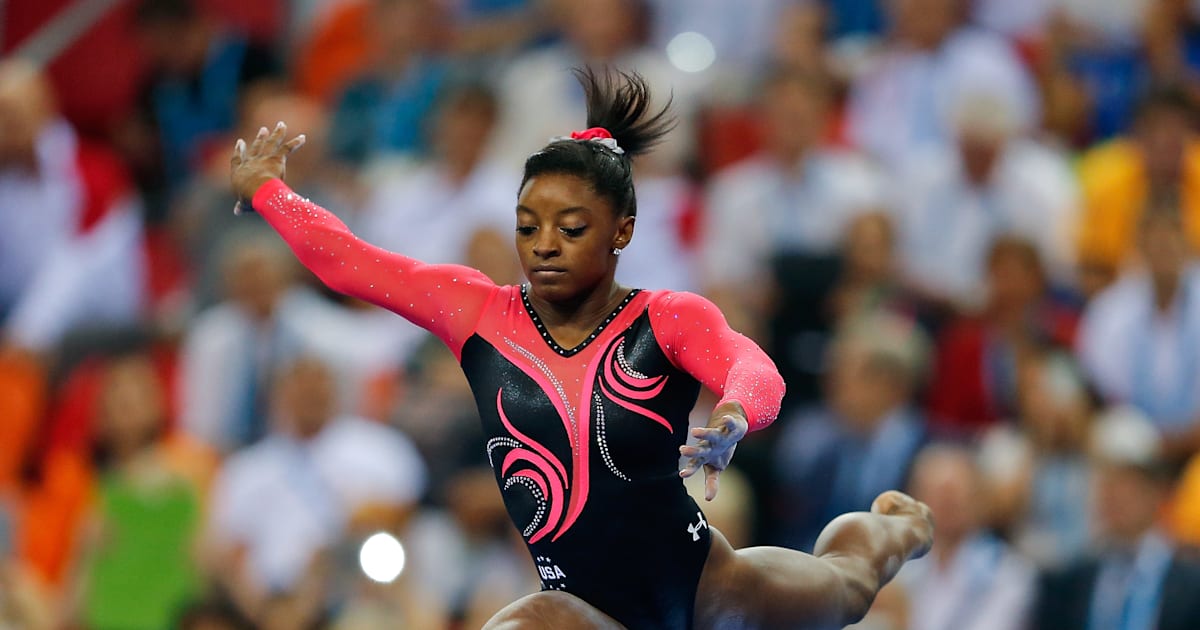 Simone Biles claims beam title at 2014 Worlds