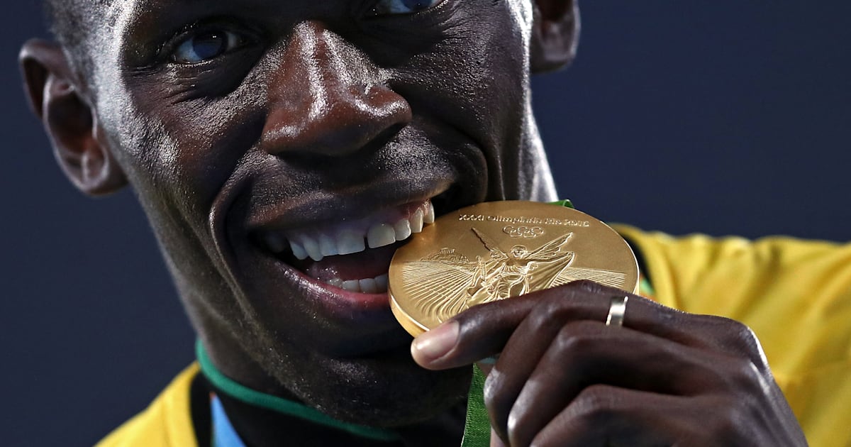 why do olympians bite their medals        
        <figure class=