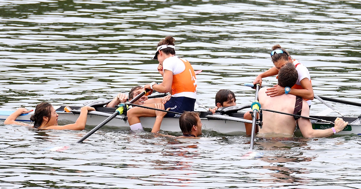 Rowers' partners swim out to the winners