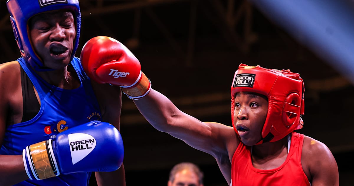 Woman boxer in athletic attire and gloves, showcasing her punch