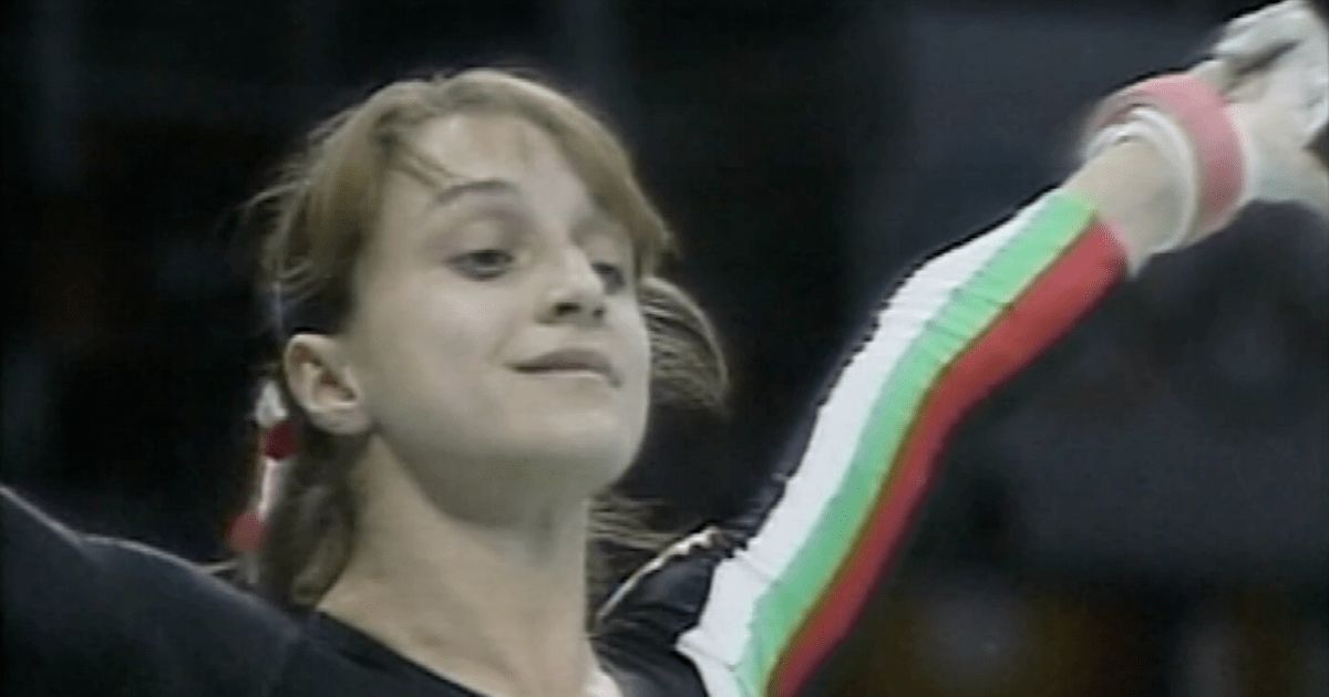 Team Bulgaria performs its optional routines on the uneven bars at the