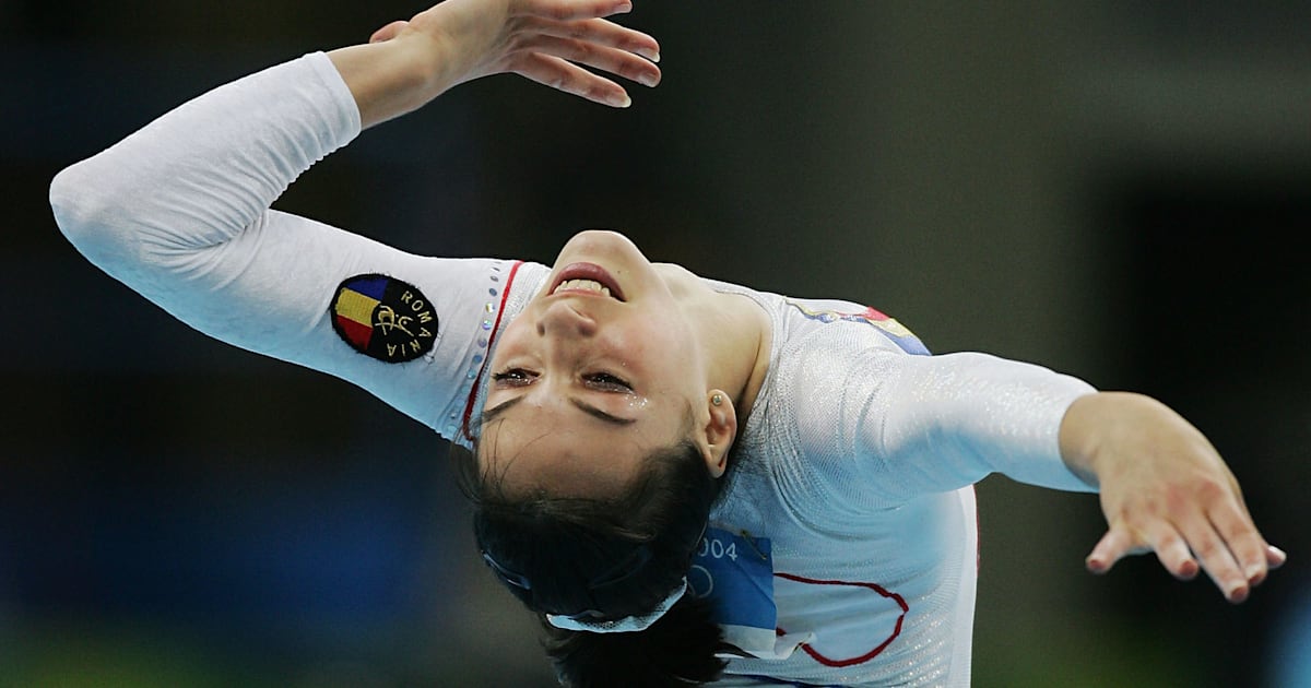 Team Romania on balance beam during qualifying round at Athens 2004